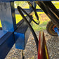 JoyT5 mobile loading ramp in Canada showing close up hydraulic hose and strong steel frame for heavy duty height adjustment and forklift loading.