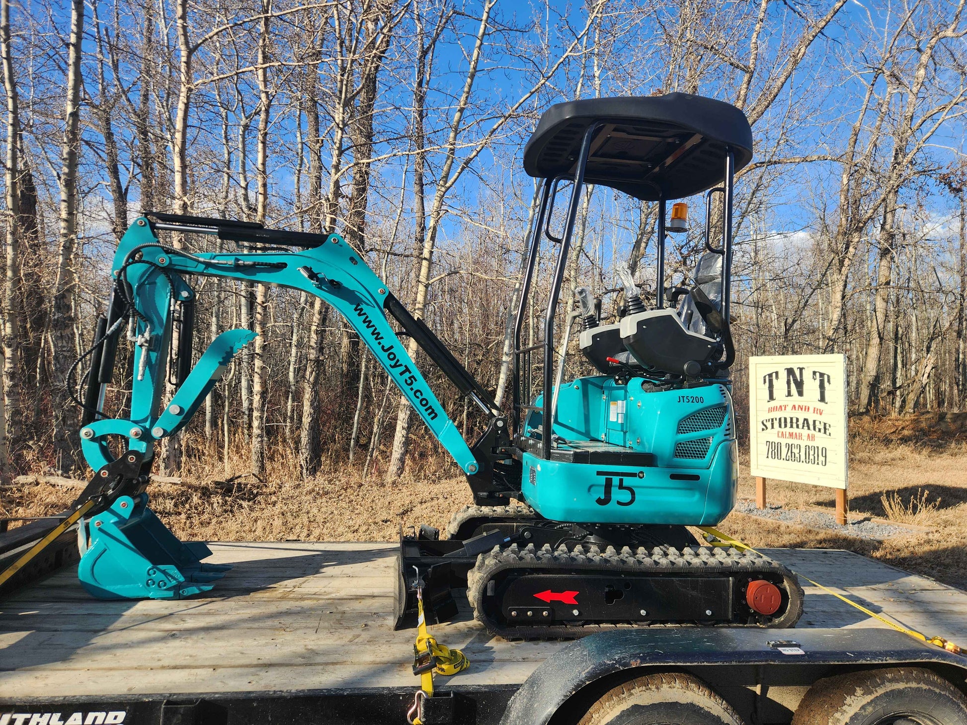 JoyT5 JT5200 2 Ton Mini Excavator Rental in Edmonton, Alberta, Canada - Available at TNT Boat & RV Storage with auger, tilt bucket, and breaker attachments