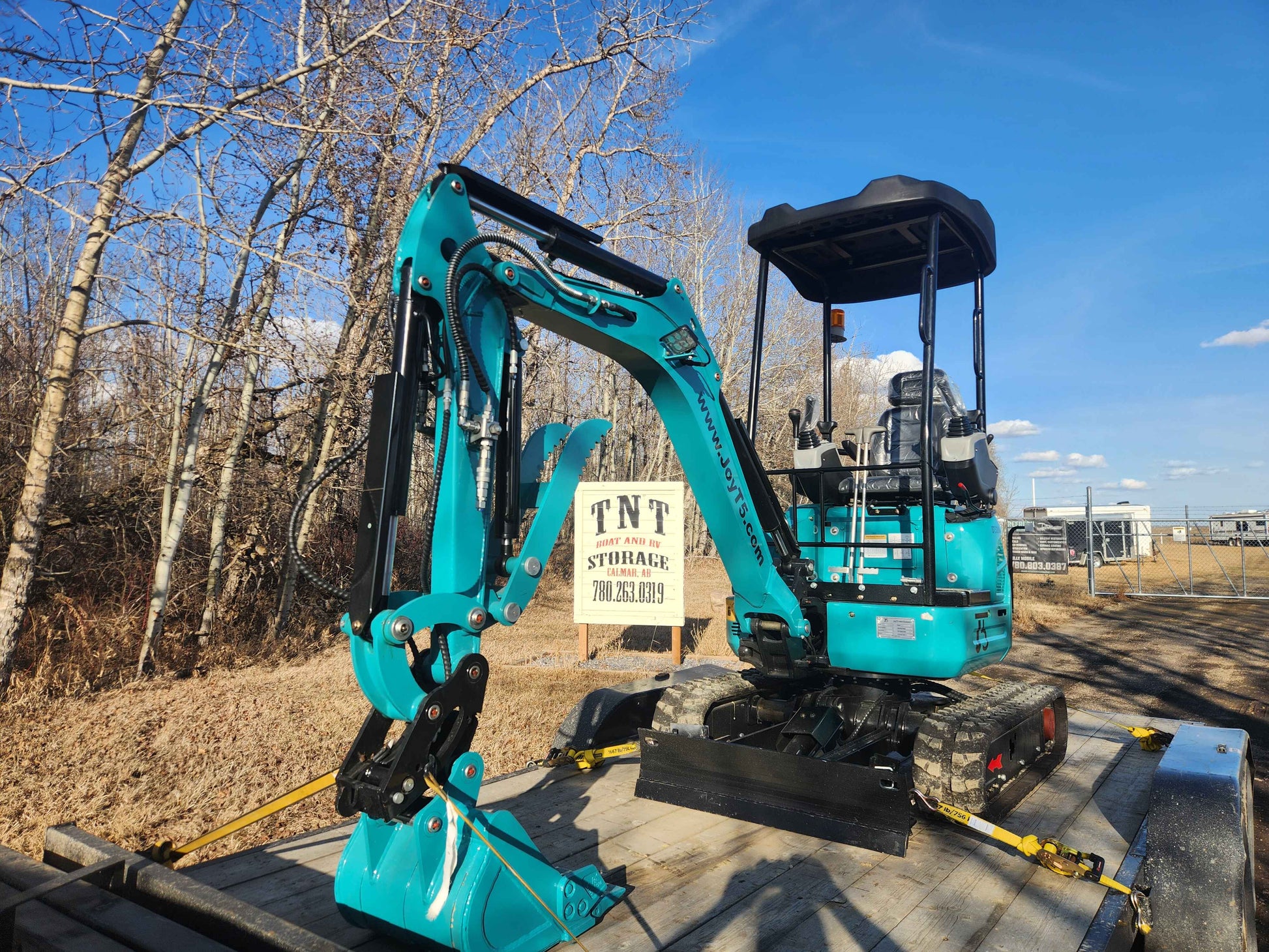 JoyT5 JT5200 Mini Excavator Rental with Auger in Edmonton, Alberta, Canada - Compact 2 Ton Excavator available from TNT Boat & RV Storage for construction and landscaping projects