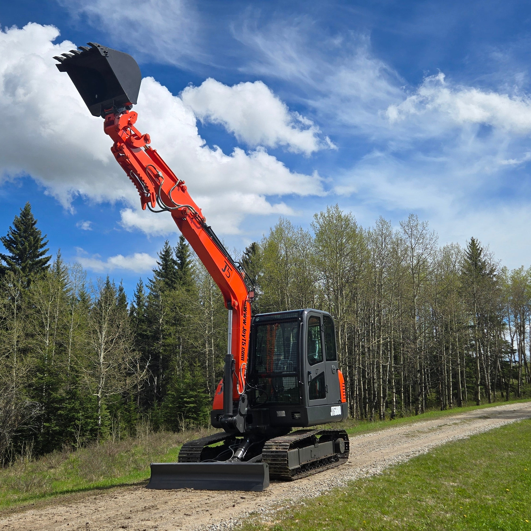 JoyT5 JT5600 6 ton mini excavator for sale in Canada diagonal high reach arm with raised bucket Yanmar diesel engine full cab compact excavator for construction lifting digging and excavation work across Canada and USA