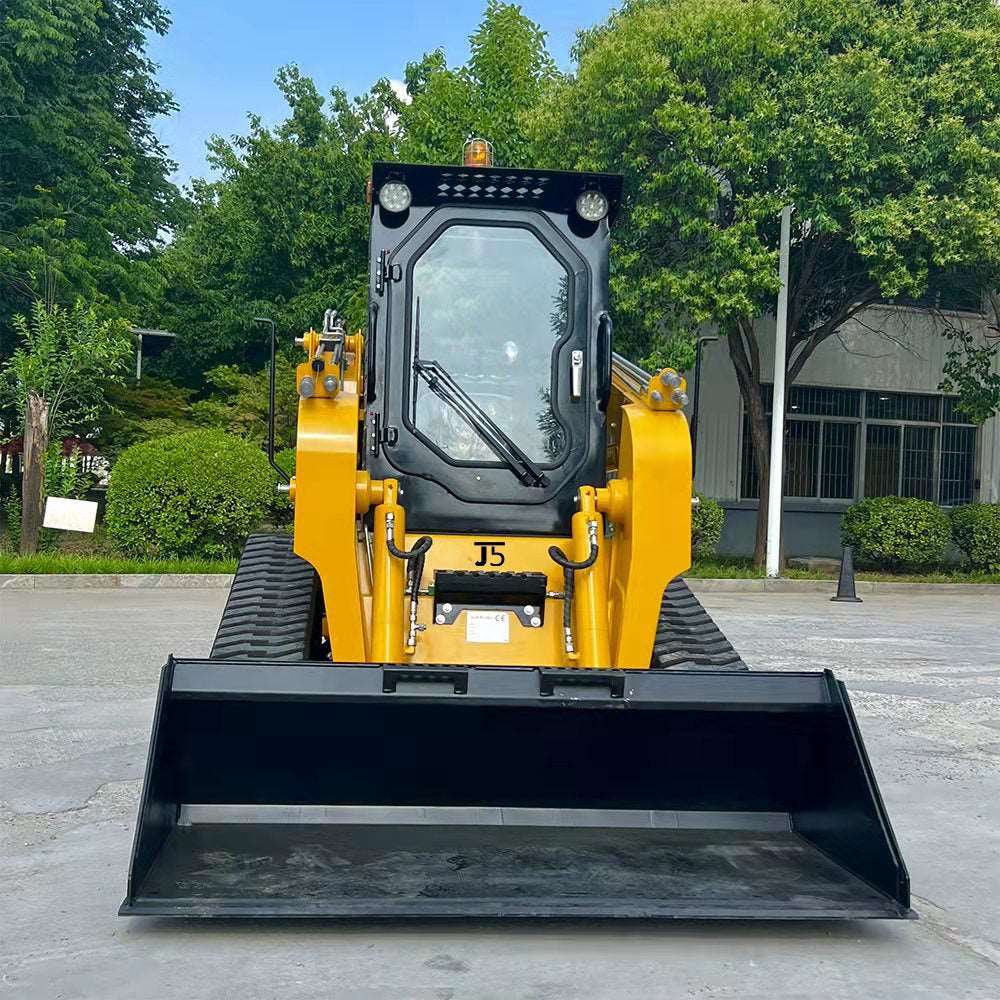 Front view of JoyT5 JT5SST75 tracked skid steer loader with 73HP diesel engine and 2200 lbs lift capacity for construction and agriculture.