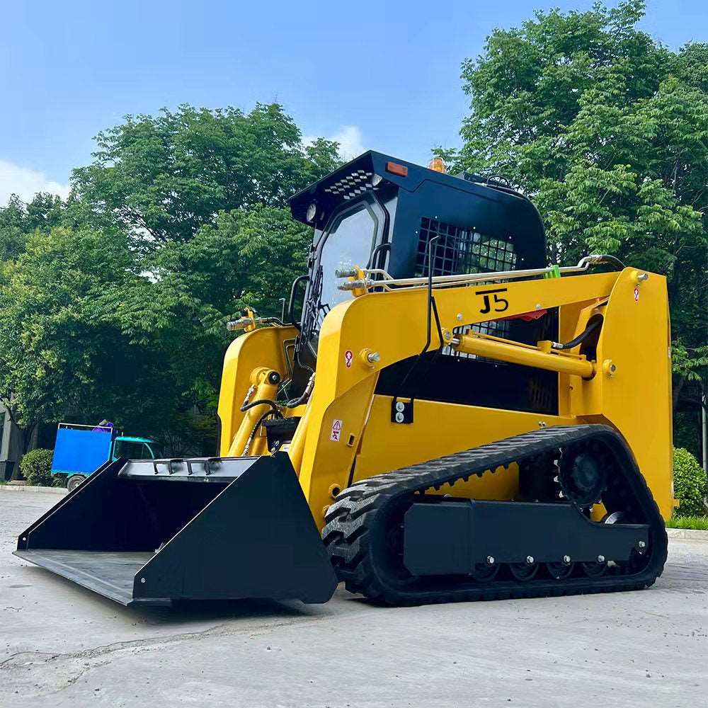JoyT5 JT5SST75 tracked skid steer loader side view, 73HP diesel engine, 2200 lbs lift, ideal for construction and farming.
