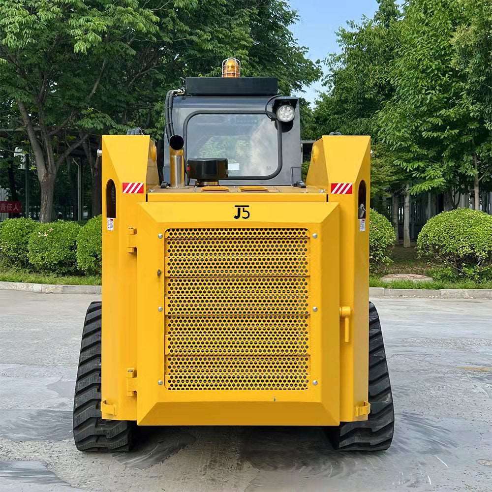 JoyT5 JT5SST75 tracked skid steer rear engine view showing heavy duty ventilation grille rubber tracks and compact loader design for construction farming landscaping and snow clearing jobs in Canada with 73 HP power