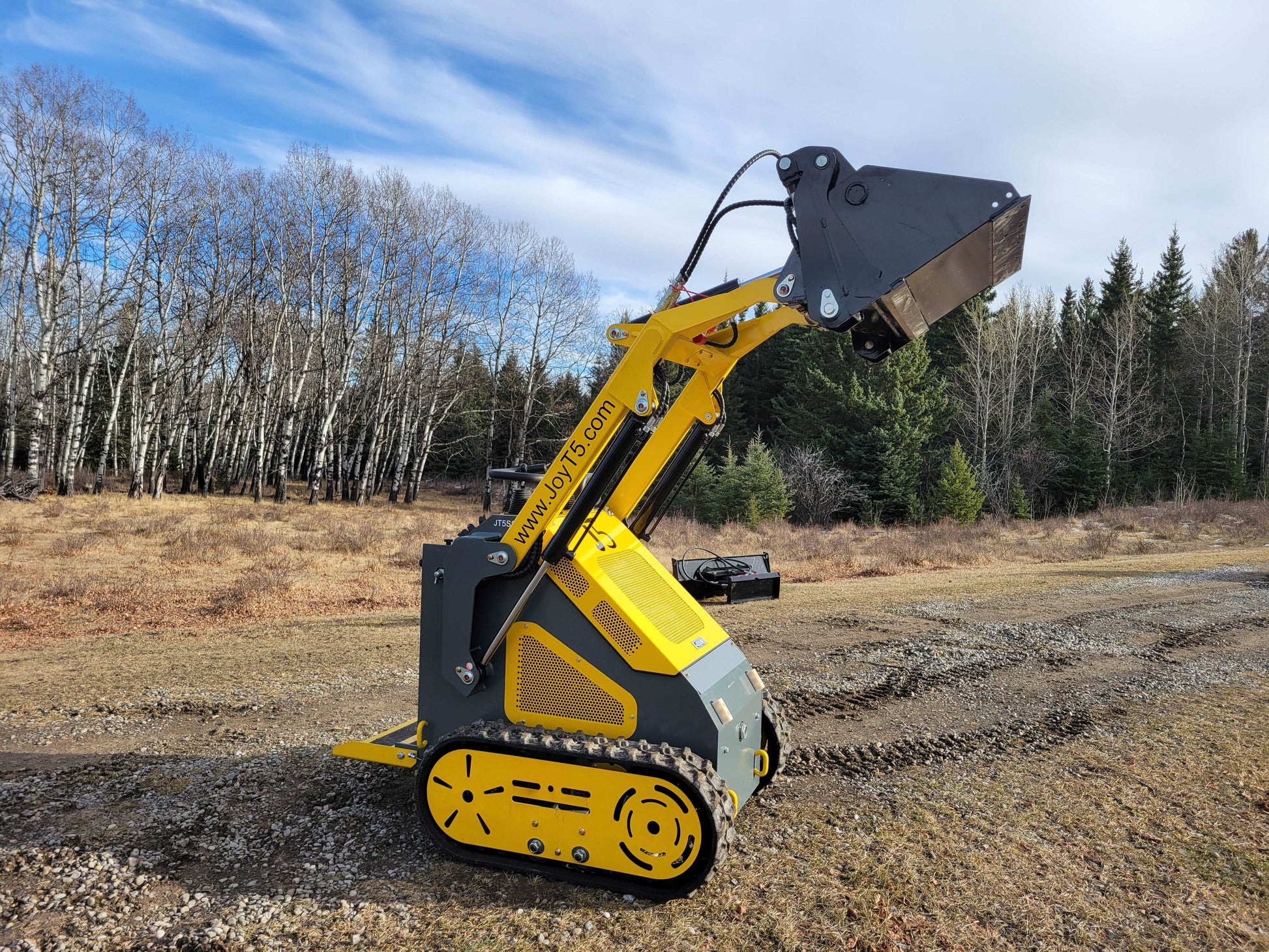 JoyT5 JT5SSTM3 mini skid steer loader with raised bucket, compact tracked skid steer for landscaping, construction, and material lifting in Canada.