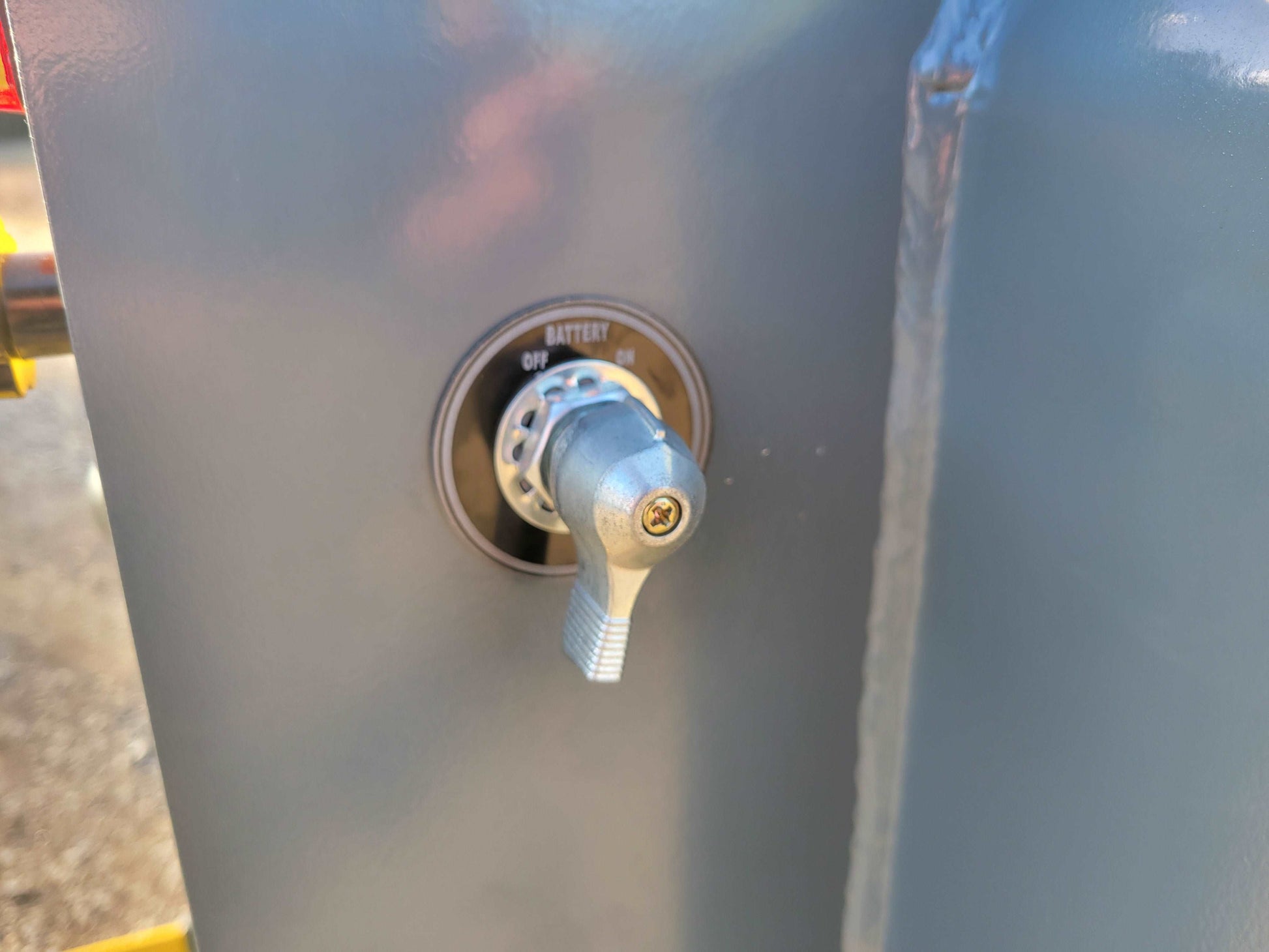 JoyT5 JT5SSTM3 mini tracked skid steer battery master switch showing electrical safety control system for compact equipment use in Canada