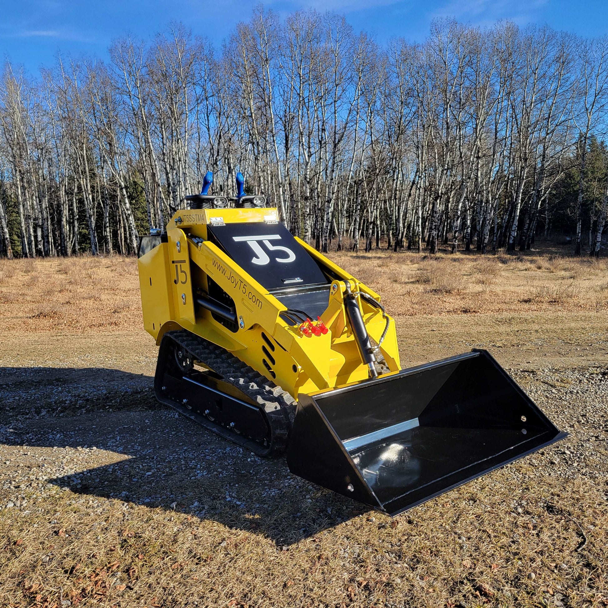 JoyT5 JT5SSTM4 tracked mini skid steer 25 HP in Canada shown from front bucket view highlighting diesel compact loader for construction landscaping and farming work