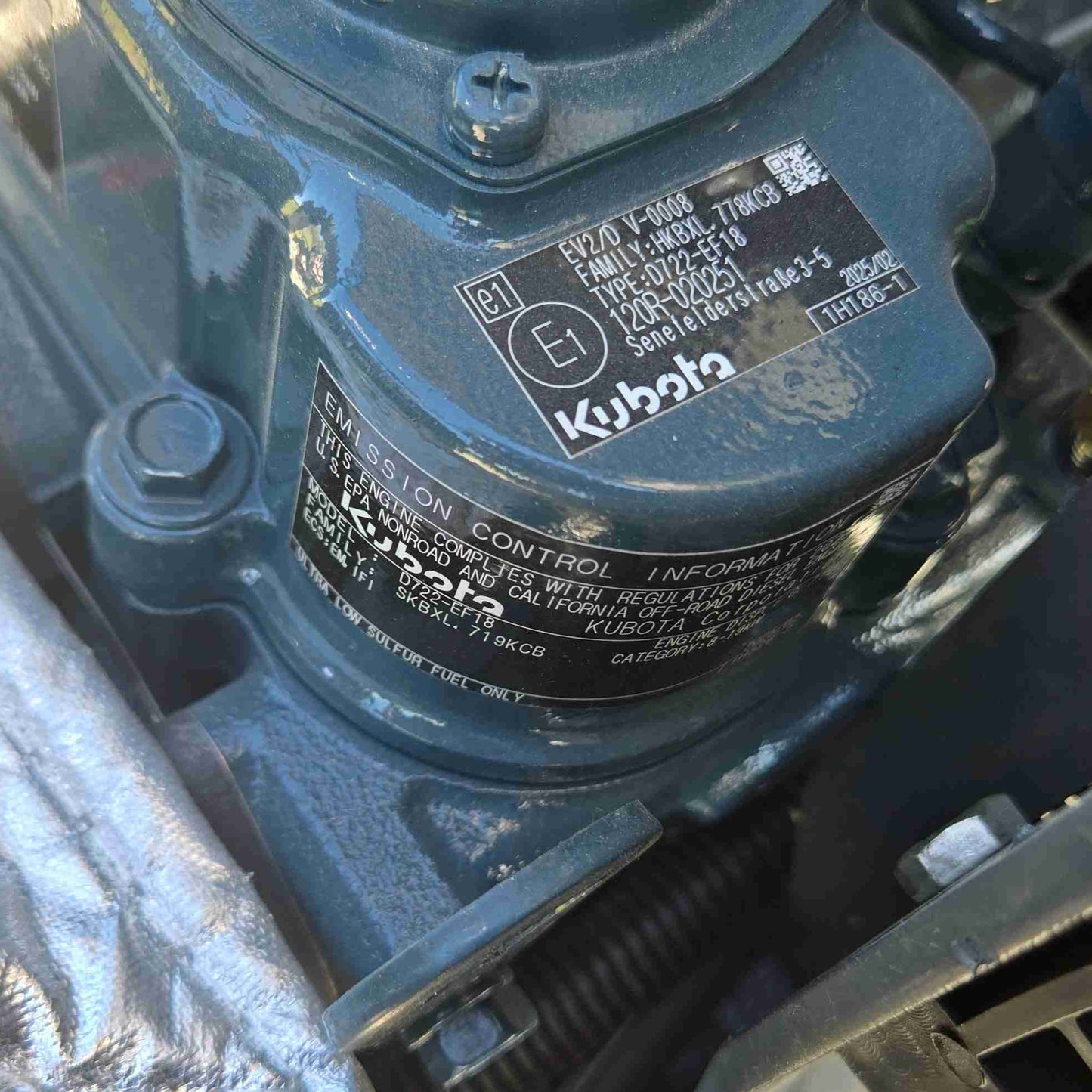 Kubota engine emission control label on JoyT5 mini excavator, compliant with Canadian regulations, highlighting reliable German-engineered performance for compact excavator use in Canada