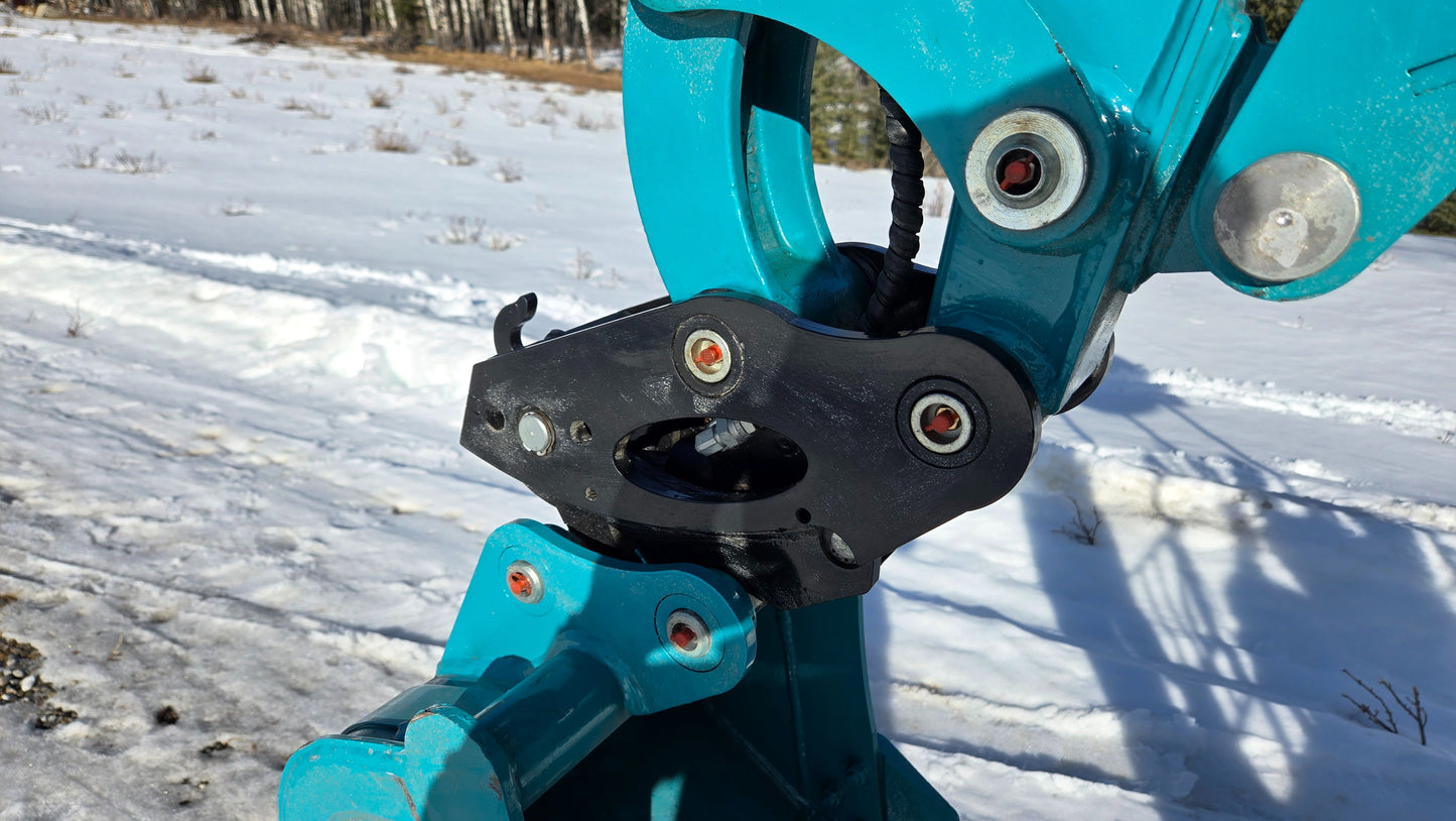 Close-up of JoyT5 mini excavator quick coupler system for easy bucket and attachment changes.
