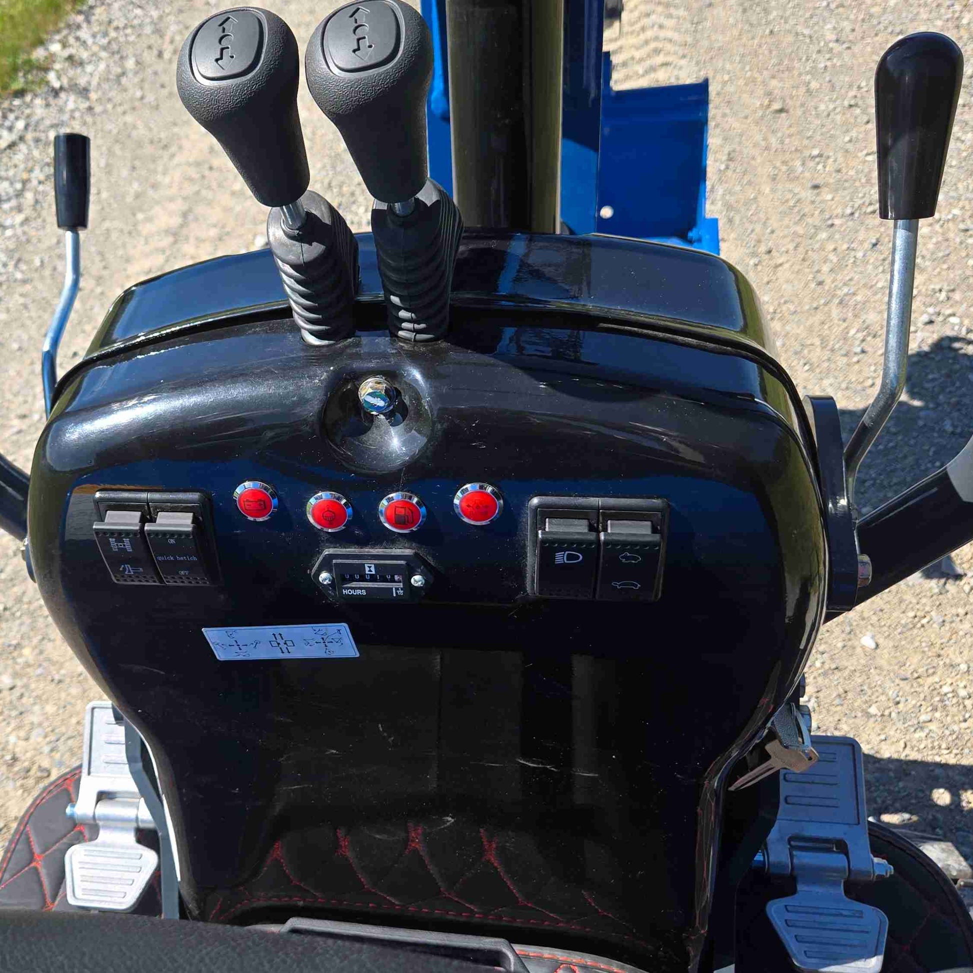 JoyT5 Rippa R13 mini excavator operator control panel with dual joysticks and switches for smooth and precise machine control on construction sites in Canada