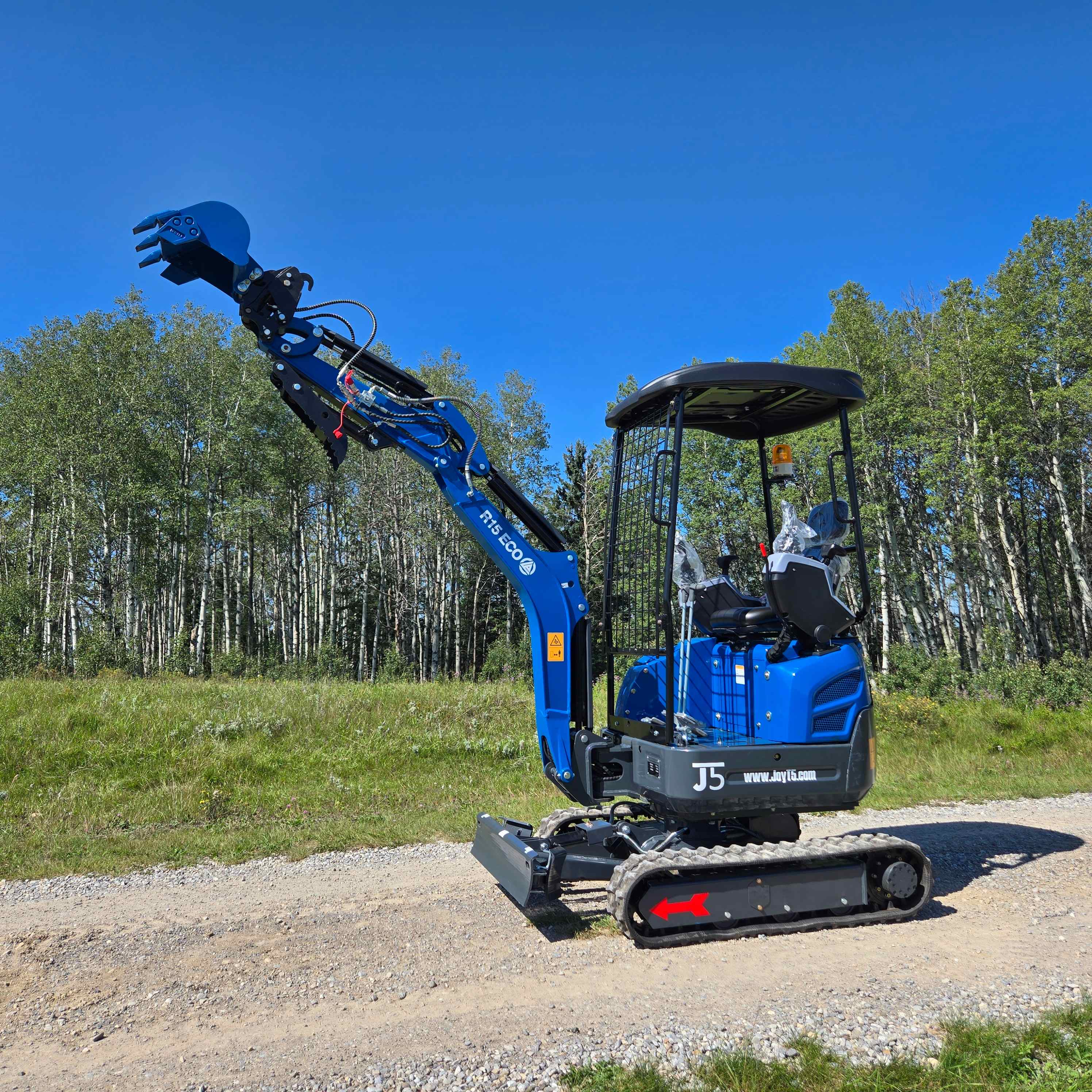 JoyT5 Rippa R15 1.5 ton mini excavator for sale in Canada compact digging machine with Kubota D722 engine showing high boom reach for landscaping residential construction and small excavation projects