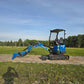 JoyT5 Rippa R18 Mini Excavator side view with bucket digging near ground level