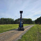 JoyT5 Rippa R18 Mini Excavator front view with bucket raised to maximum height