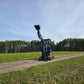 JoyT5 Rippa R18 Mini Excavator side front view with bucket raised for lifting and digging operations