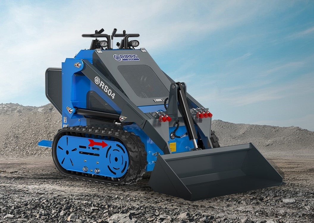 JoyT5 Rippa RS04 compact skid steer loader with front bucket on rocky construction site for land clearing in Canada and USA
