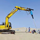 Excavator-mounted JT5 AAS-360 wireless alignment indicator and angle sensor used in auger drilling for foundation piles – precision alignment tool for construction and excavation equipment.

