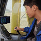 Excavator operator using JT5 ATS in‑cab torque and alignment monitor EM‑10W – wireless construction display showing real‑time torque and angle data for helical pile installation and drilling applications.