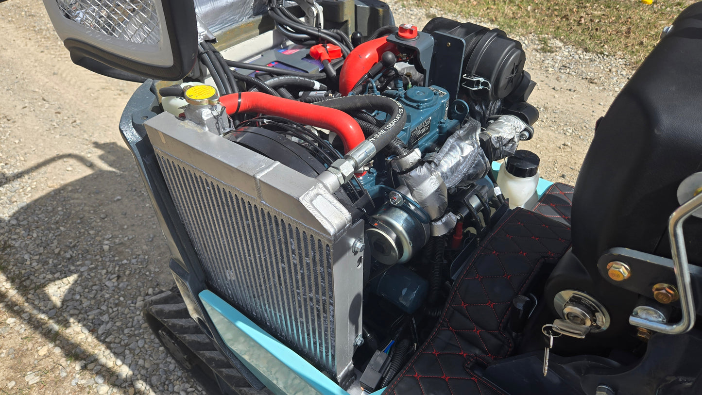 JT5120P mini excavator engine and radiator system with cooling hoses and components.
