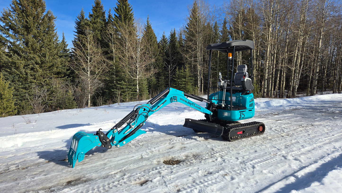 Side view of JoyT5 JT5200 2 ton mini excavator with boom fully lowered. Compact Kubota-powered excavator with zero-tail swing, side swing boom, extendable tracks and hydraulic thumb for digging and landscaping.
