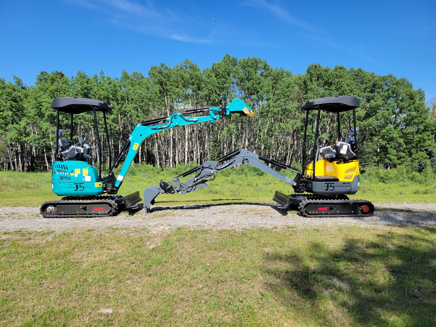 JT5200 mini excavators in blue and yellow color options displayed side by side with extended arms.
