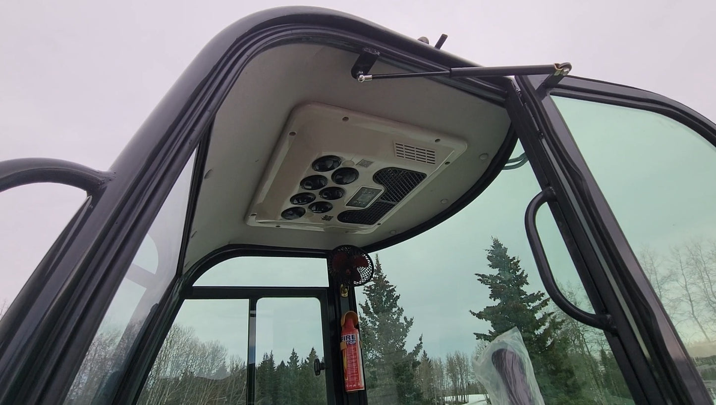 JT5200 Special Edition 2 Ton Mini Excavator cab interior with air conditioning, fan, and comfort features – Kubota engine compact digger for sale in Canada and USA.