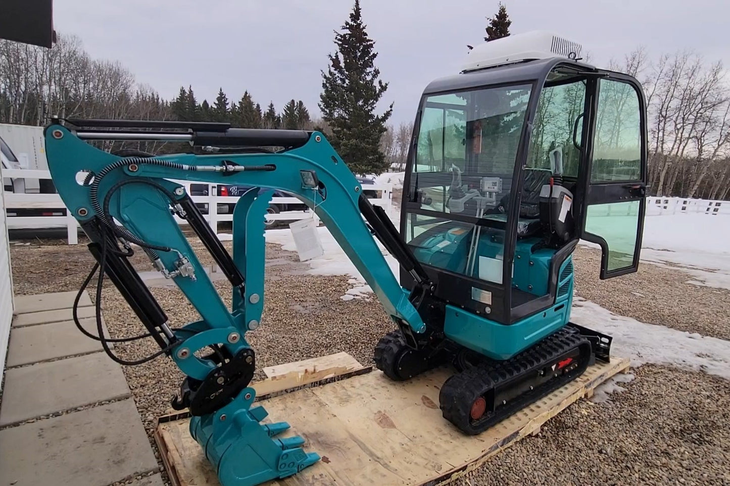 JT5200 Special Edition 2 ton mini excavator with zero tail design full cab and Kubota D902 engine displayed in Canada as a loaded compact machine with JoyT5 dealer support