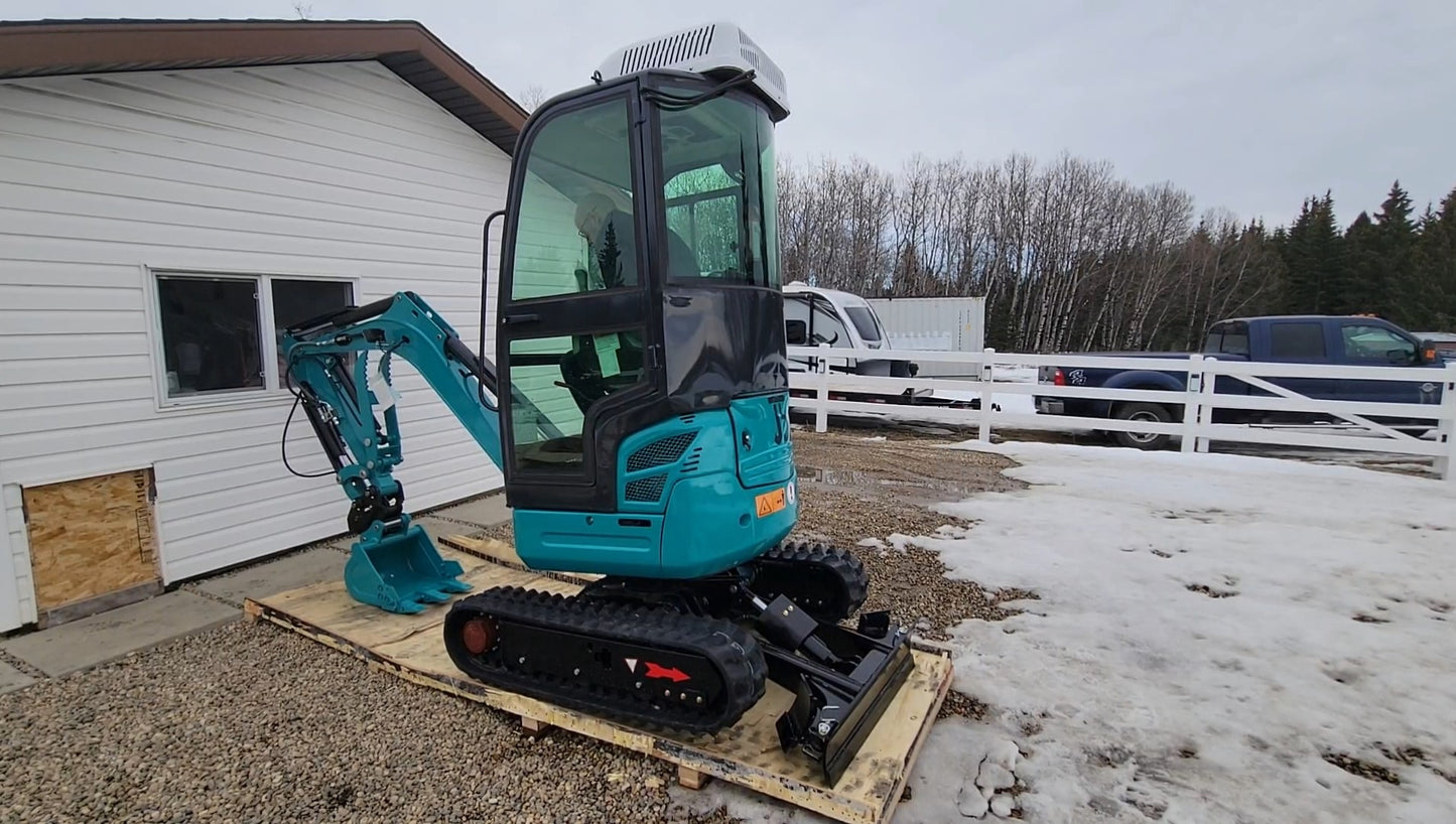 JT5200 Special Edition 2 ton mini excavator in Canada showing full cab with roof mounted AC zero tail compact design rubber tracks and rear side view supported by JoyT5