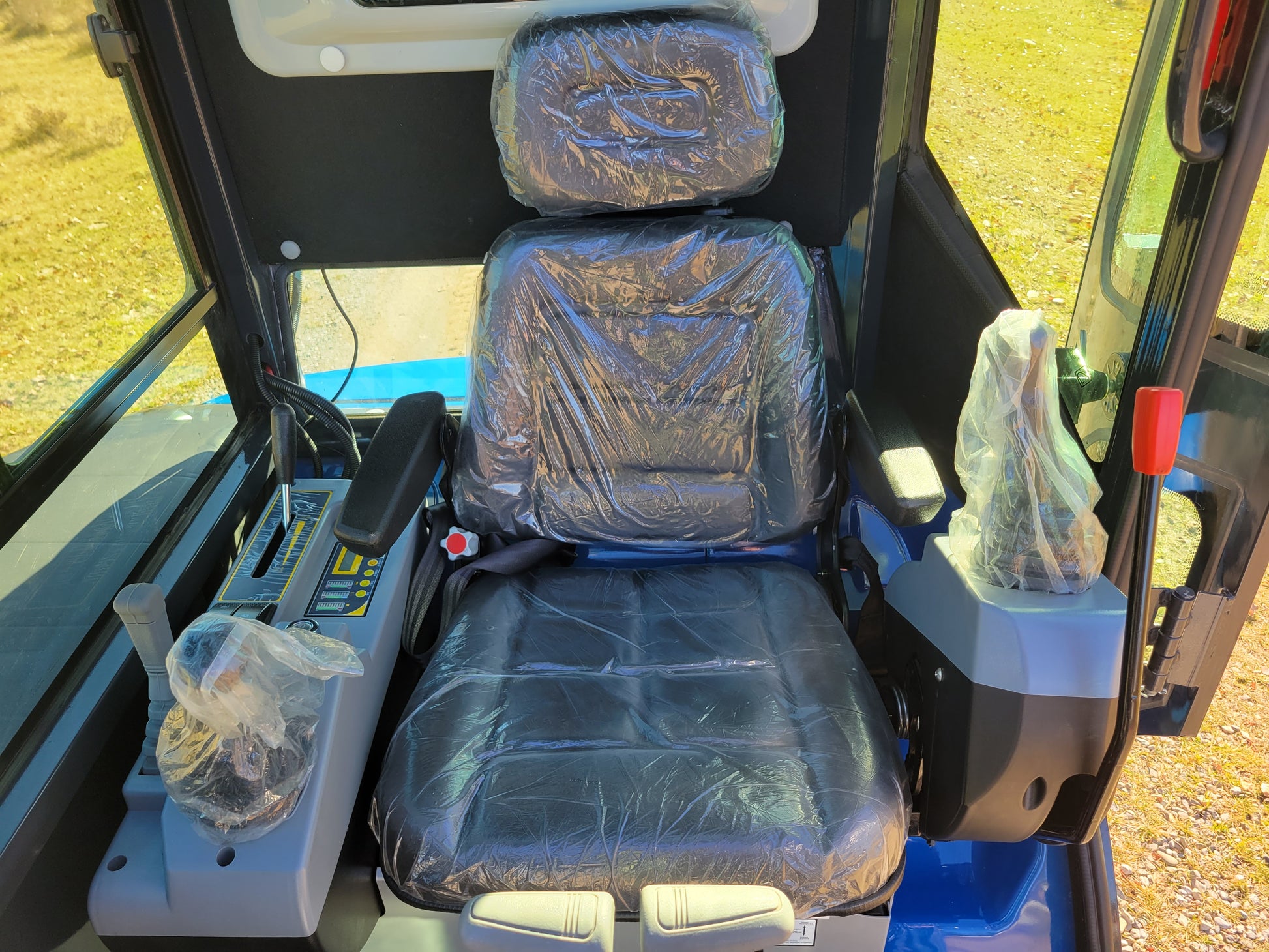 JT5350 3.5 Ton Mini Excavator cabin seat with controls | JoyT5 Kubota powered compact excavator for sale with cab AC, hydraulic thumb, and quick hitch