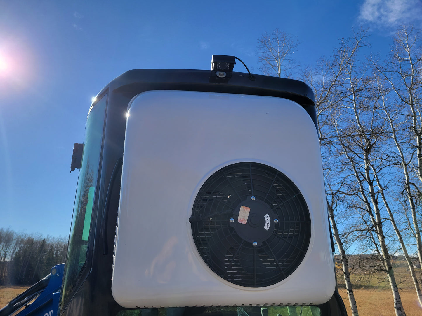 JT5350 3.5 ton mini excavator with Kubota engine showing rear cabin AC unit and cooling fan system designed for operator comfort during construction work in Canada