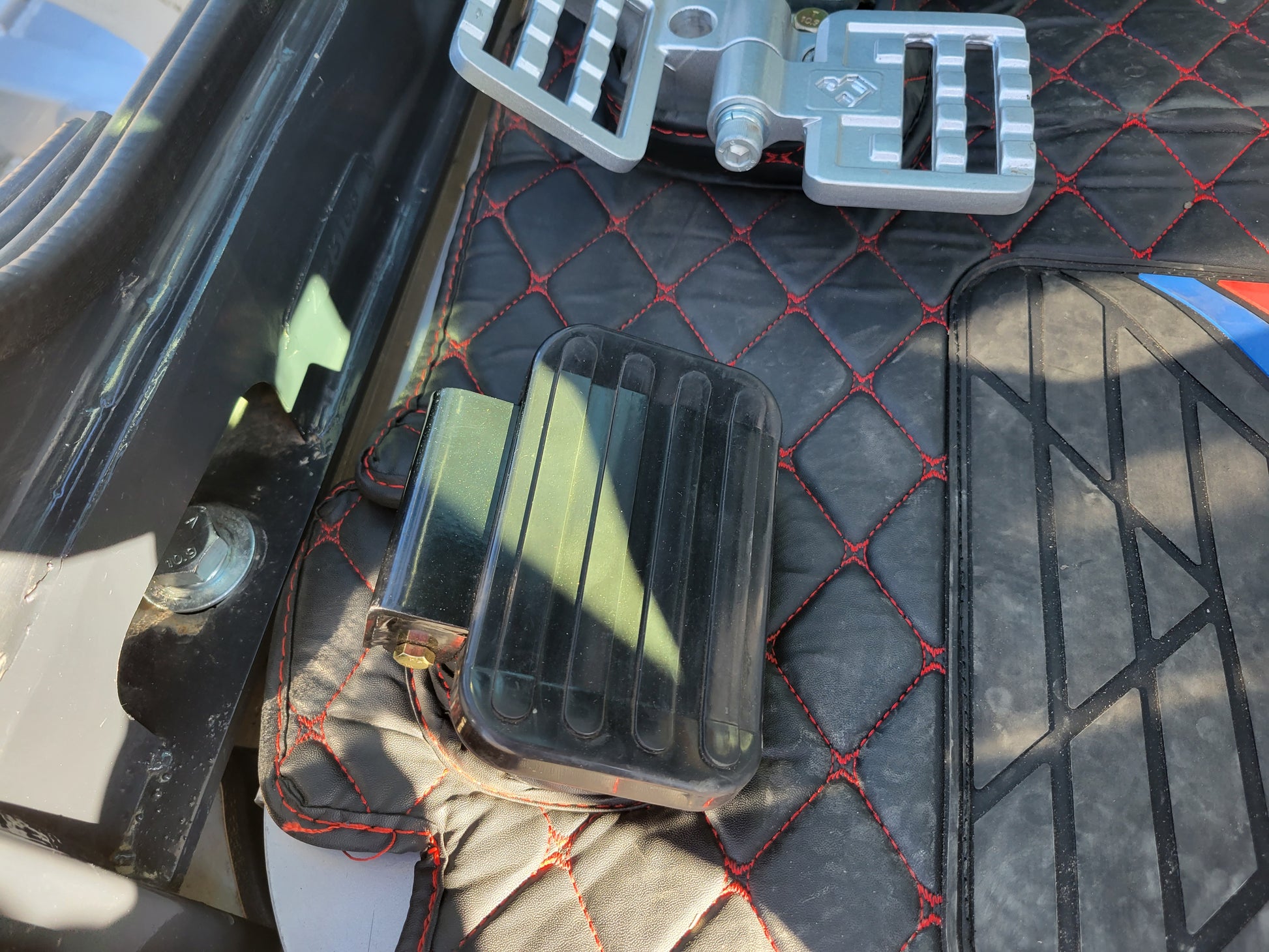 JT5350 3.5 ton mini excavator with Kubota engine closeup of heavy duty foot pedal inside operator cabin designed for control and comfort during construction in Canada