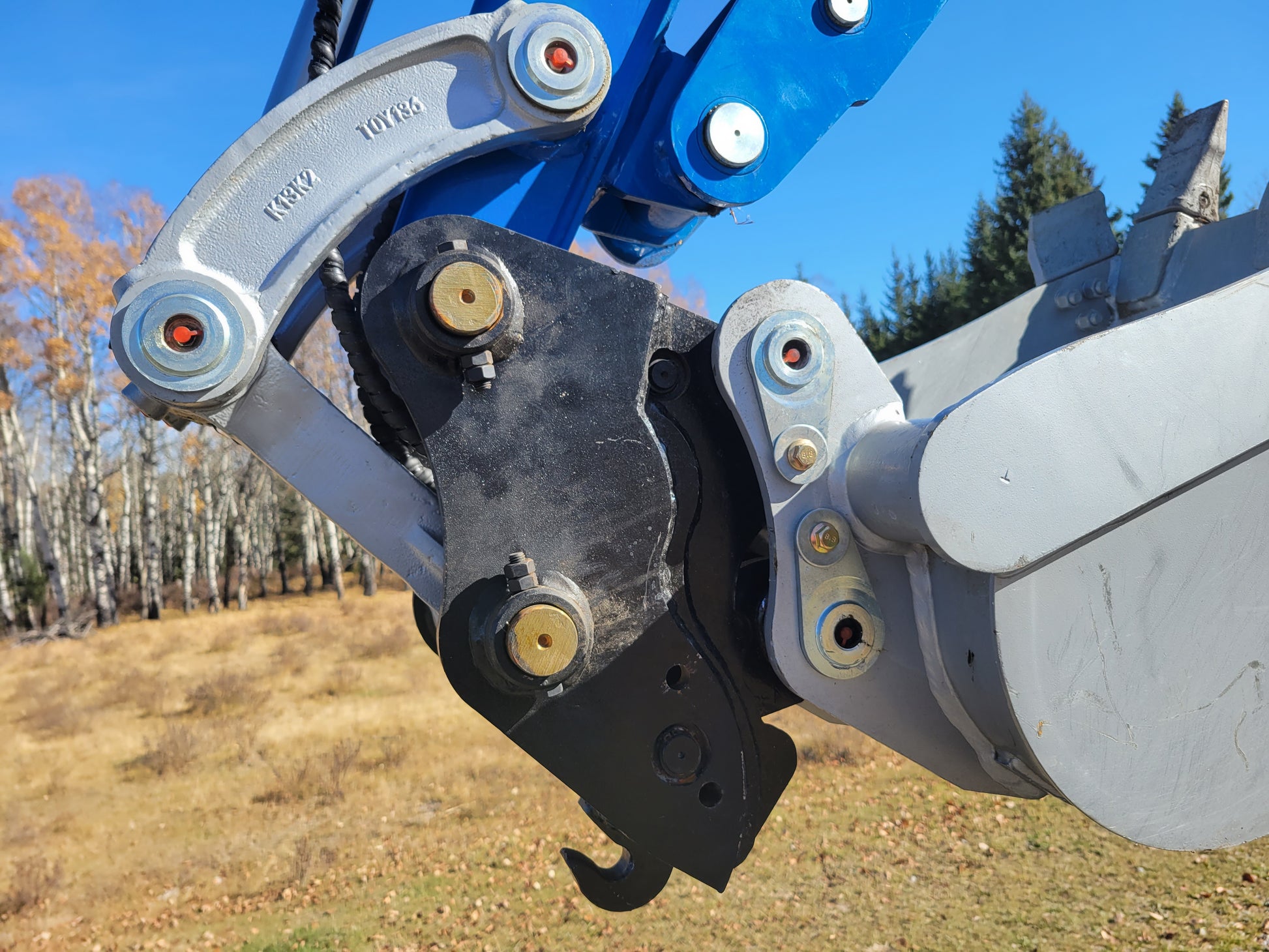 JT5350 3.5 ton mini excavator hydraulic coupler attachment close view showing durable connection system powered by Kubota engine for construction use in Canada