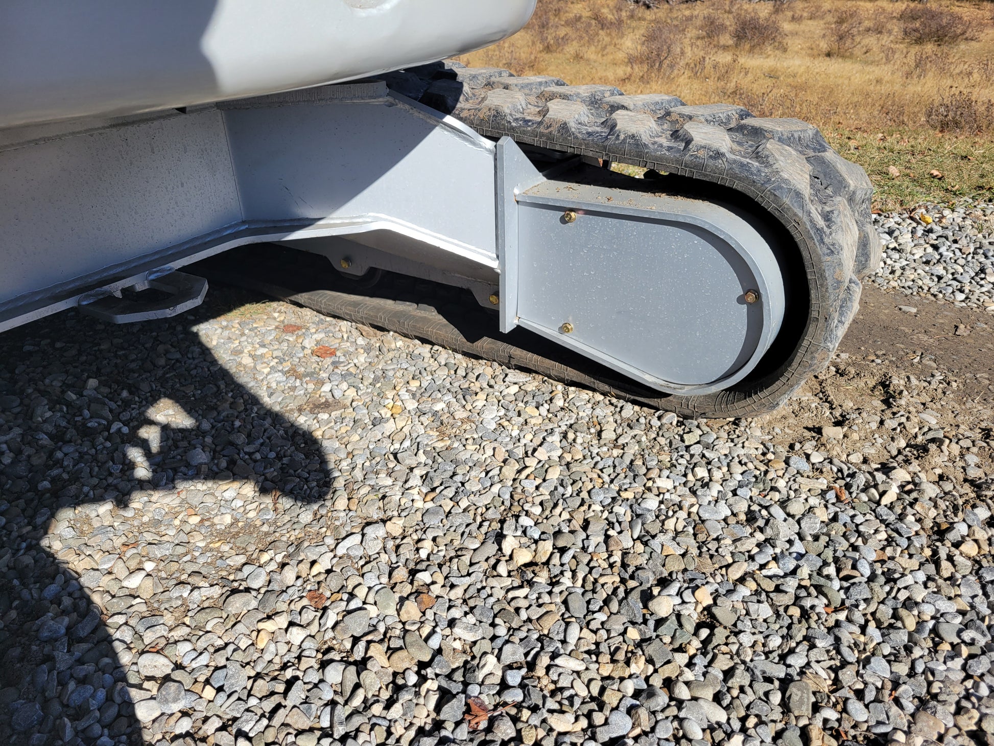 JT5350 3.5 ton mini excavator with Kubota engine close view of track roller and frame structure designed for stability and durability on Canadian construction sites