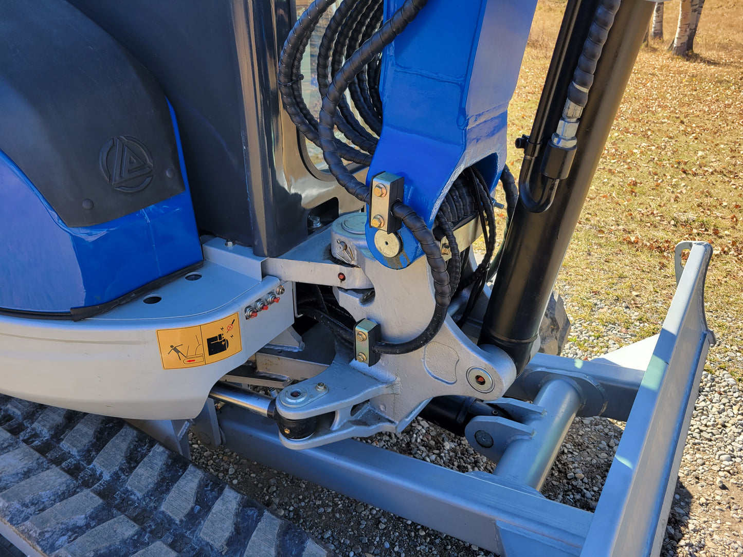 JT5350 3.5 ton mini excavator in Canada with JoyT5 showing side swing boom joint hydraulic hoses and strong blade linkage for construction work