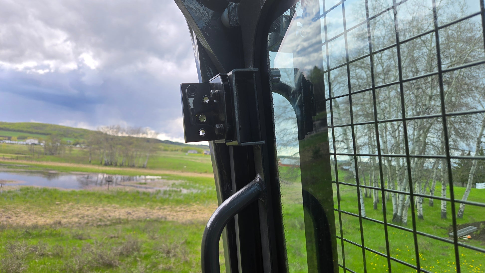 JT5600 6 ton mini excavator for sale in Canada JoyT5 cabin door hinge and safety glass showing strong build and visibility for compact excavator work in Canada

