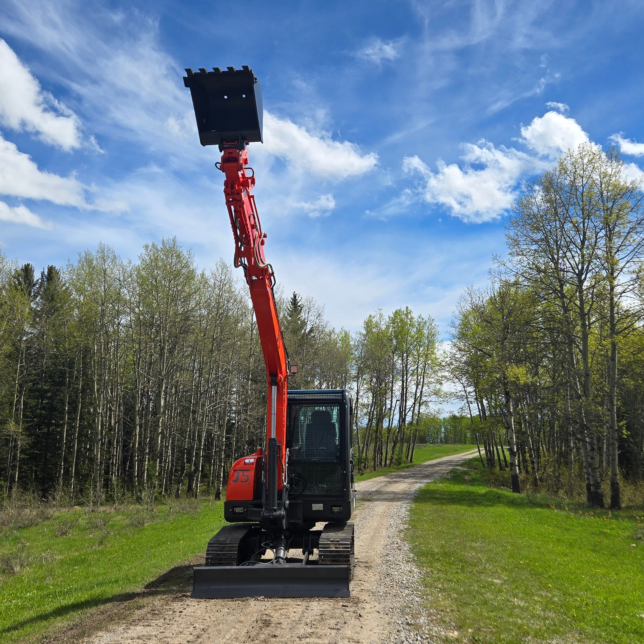JT5600 6 ton mini excavator for sale in Canada powered by Yanmar engine compact hydraulic excavator lifting bucket high for construction and landscaping durable small excavator working outdoors
