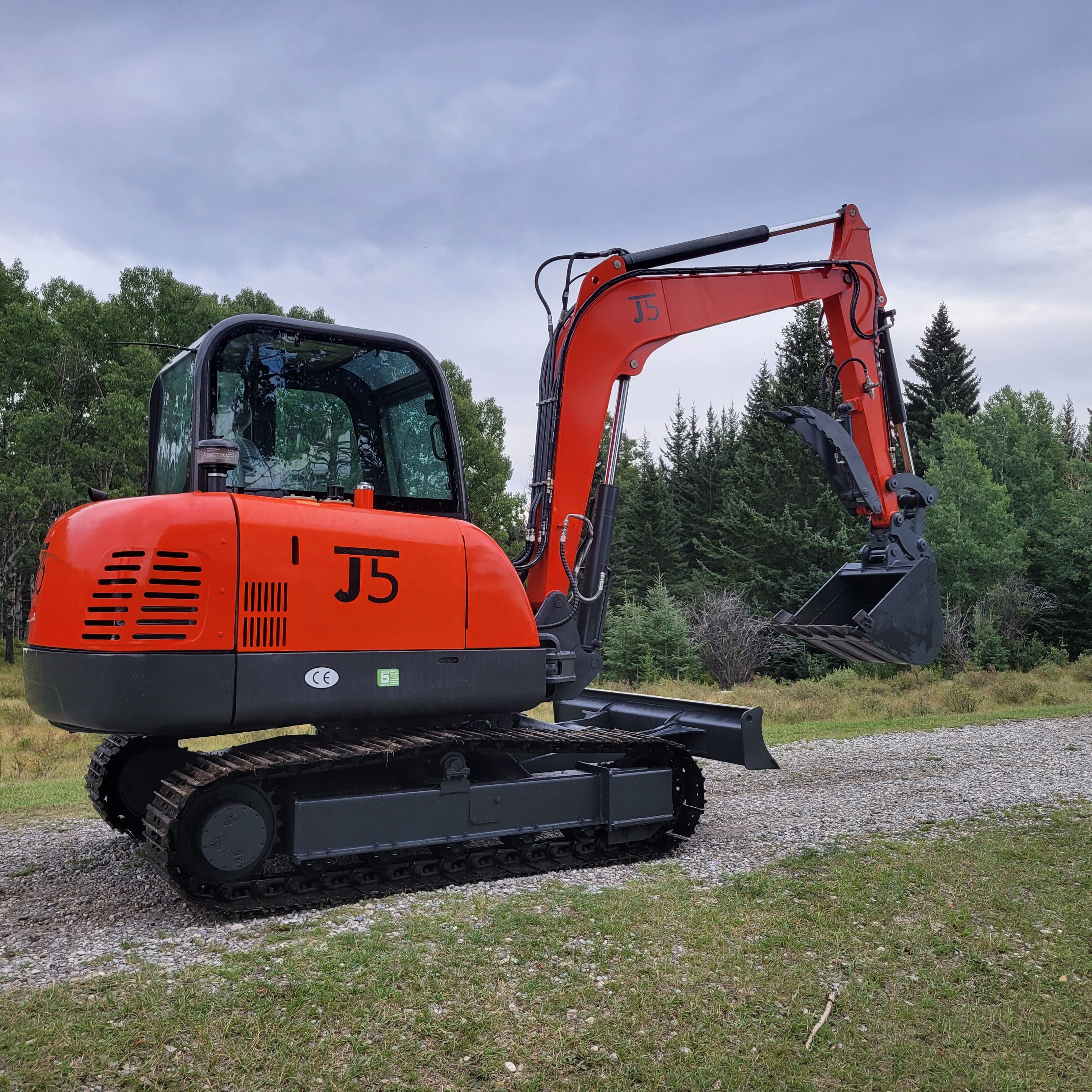 JT5600 6 ton mini excavator for sale in Canada powered by Yanmar engine compact machine working on gravel path durable small excavator for landscaping and construction projects