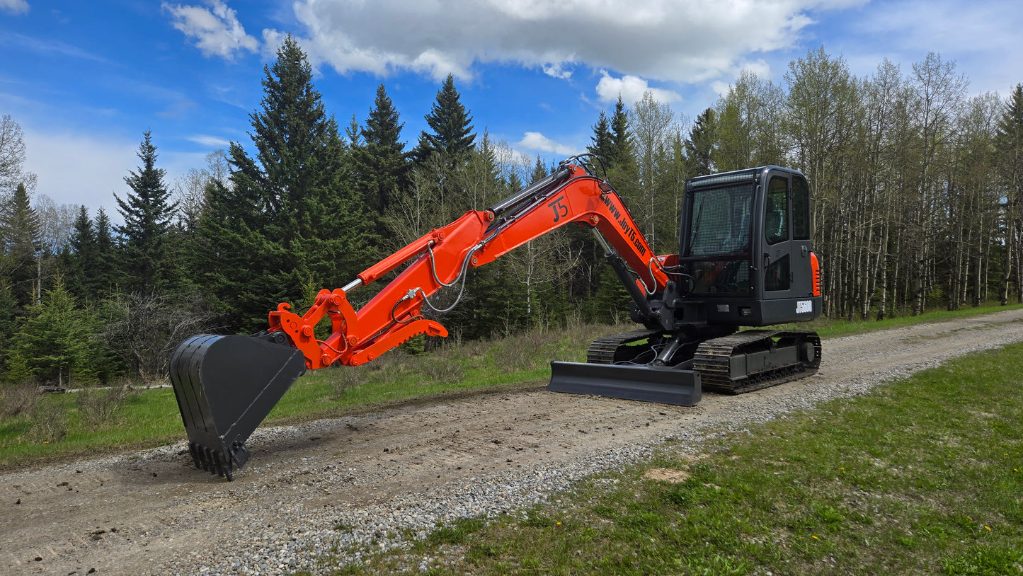 JT5600 6 ton mini excavator for sale in Canada Yanmar engine compact hydraulic excavator parked on gravel road for landscaping and construction projects durable small excavator for heavy work