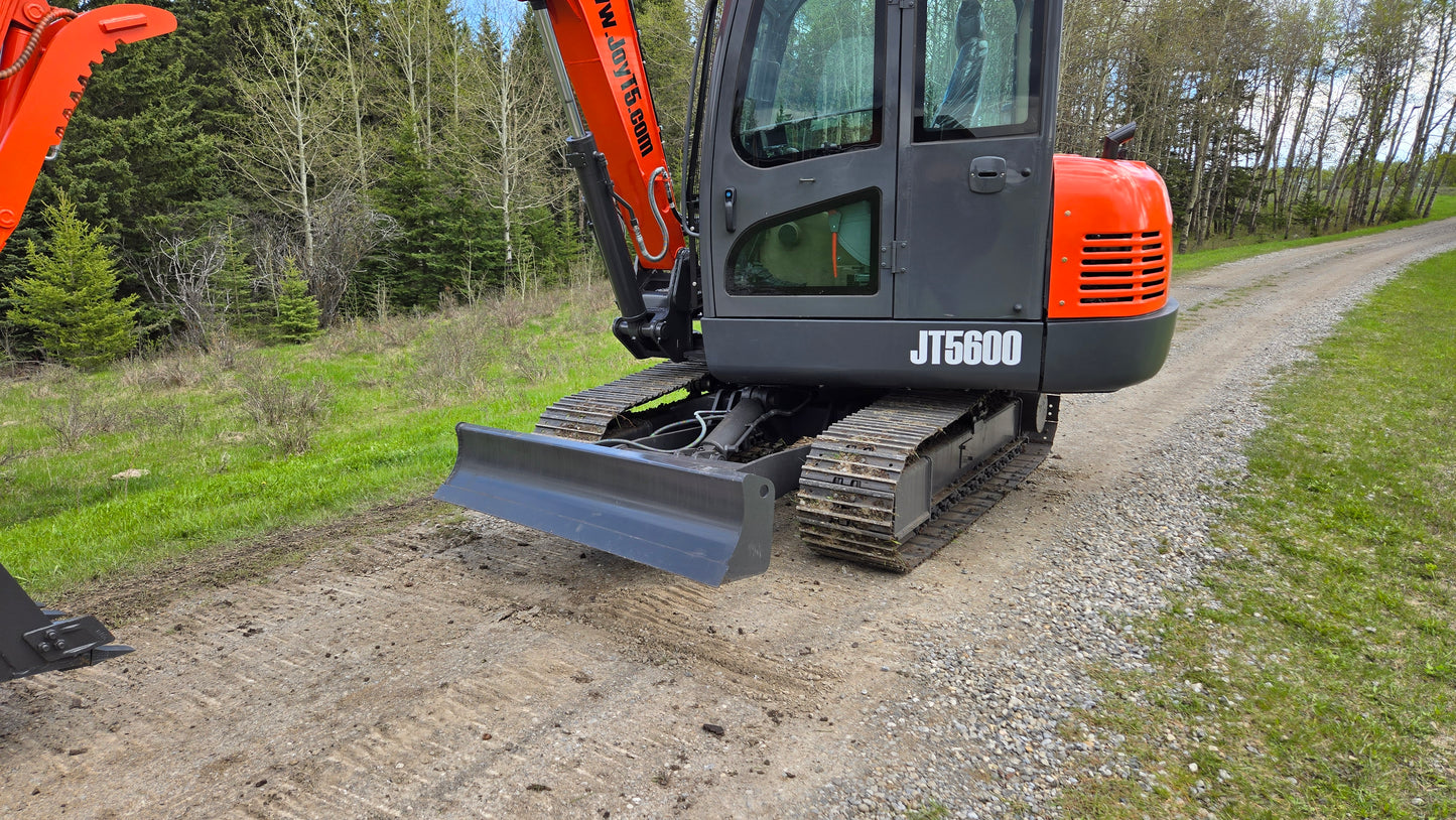 JT5600 JoyT5 6 ton mini excavator front view with dozer blade and rubber crawler tracks