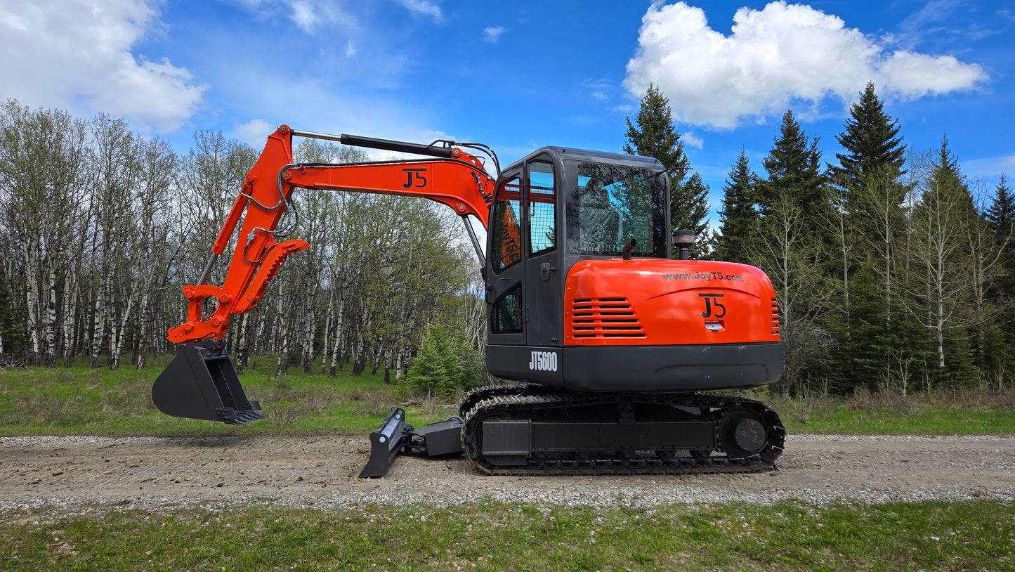 JT5600 JoyT5 mini excavator right side close-up with bucket lifted and dozer blade visible