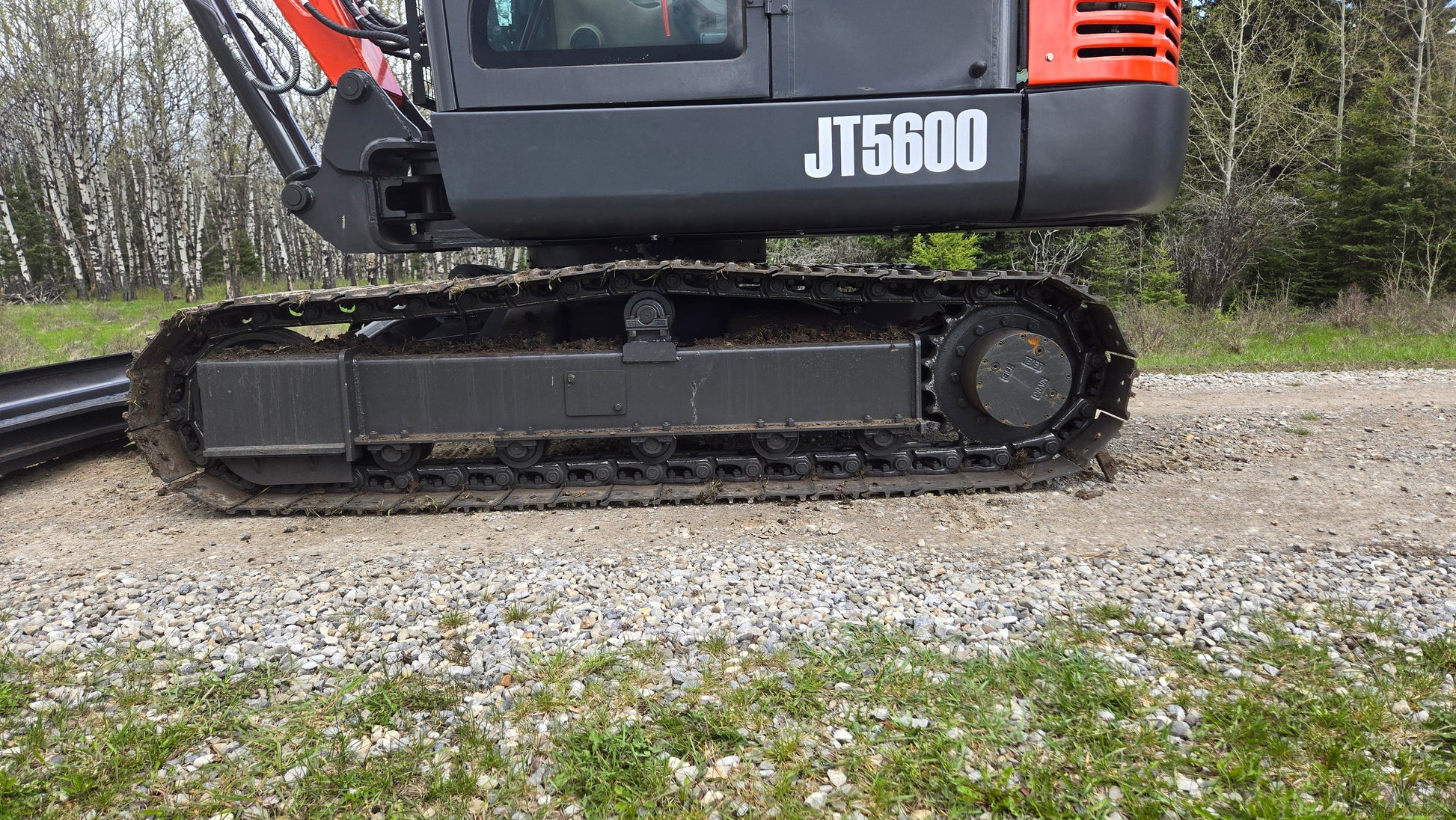JT5600 mini excavator heavy-duty track system close-up view