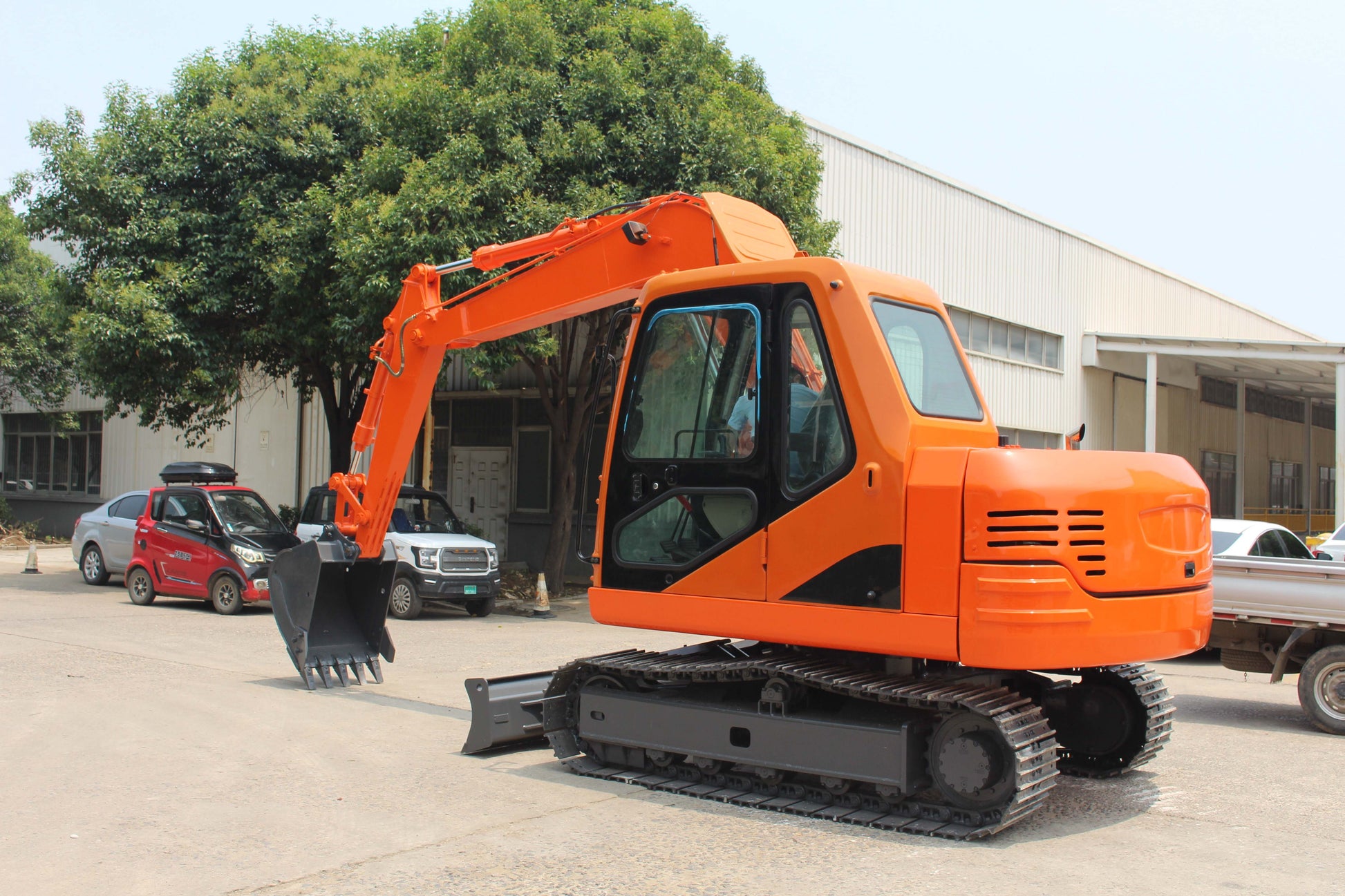 JT5800 8 Ton Mini Excavator | 17,600 lbs for Sale – side view of Yanmar diesel powered compact excavator with full cab AC and dozer blade for contractors