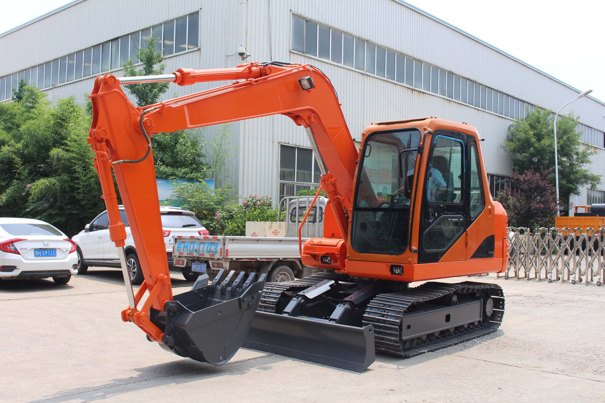 JT5800 8 Ton Mini Excavator | 17,600 lbs for Sale – Yanmar diesel powered excavator with hydraulic thumb, full cab AC and dozer blade for construction projects