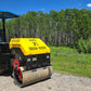 JT5DR35 double drum road roller working on gravel road with green forest background by JoyT5 for sale in Calgary Alberta Canada