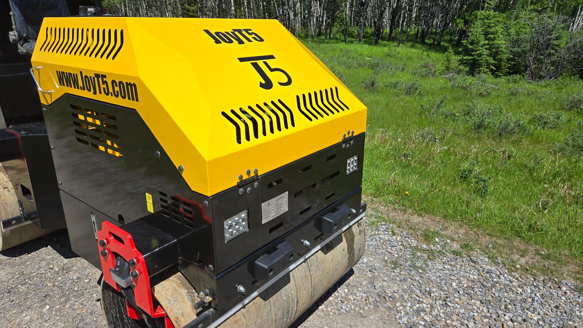 JT5DR35 drum roller engine cover and front drum close up Canadian construction compactor used as a vibratory drum roller for road and asphalt work