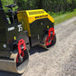 JT5DR35 drum roller working on gravel road showing dual steel drums and compact design for asphalt and soil compaction projects in Canada