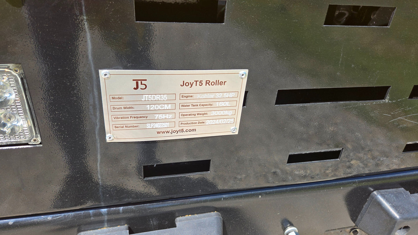 Specification plate of JT5DR35 drum roller showing technical details like engine type drum width and vibration frequency for compact construction equipment in Canada