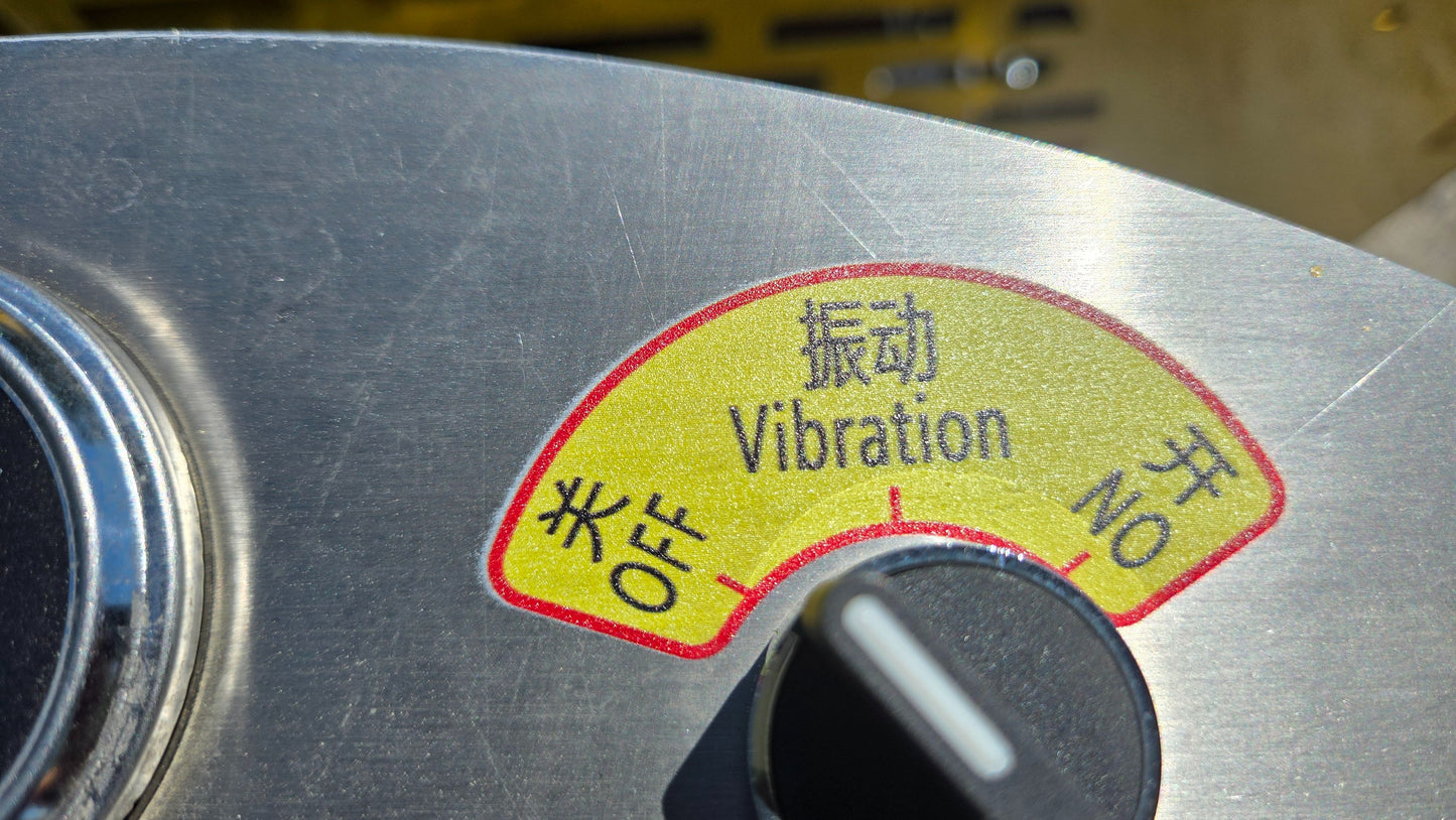 Close up of JT5DR35 drum roller vibration control switch used for adjusting compaction performance in road construction and asphalt projects in Canada

