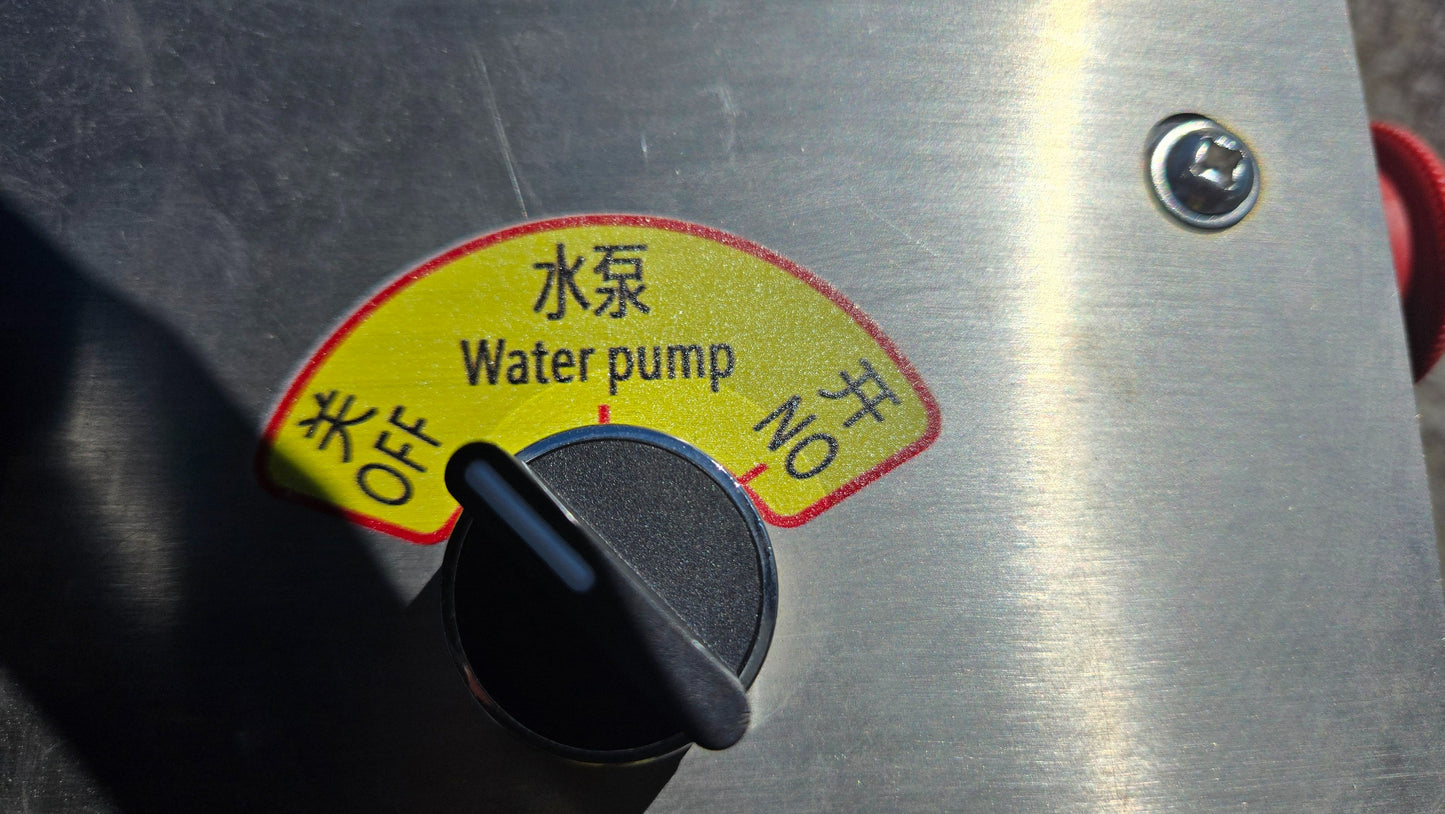 Water pump control knob of JT5DR35 drum roller showing on and off switch used in construction and compaction equipment in Canada