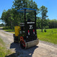 JT5DR35 vibratory drum roller working on a rural gravel road in Canada ideal soil compactor and road construction roller with Kohler engine