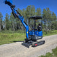 Mini excavator for sale Rippa R15 digging arm raised on gravel road with trees