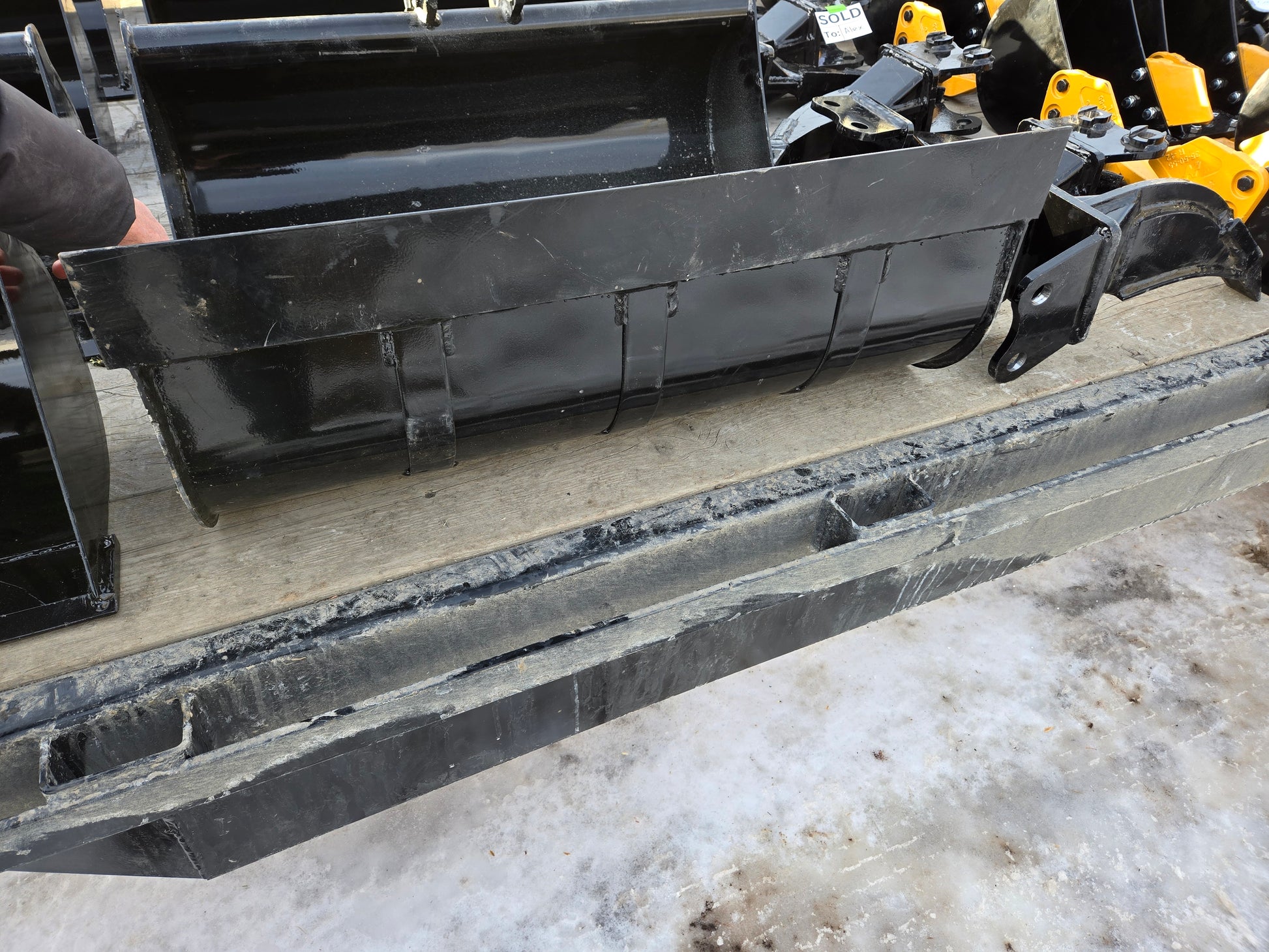 Mini excavator grading bucket attachment with 90x92x25mm mount pattern made for Agrotk and FF Industrial in Canada used for soil leveling and trenching work



